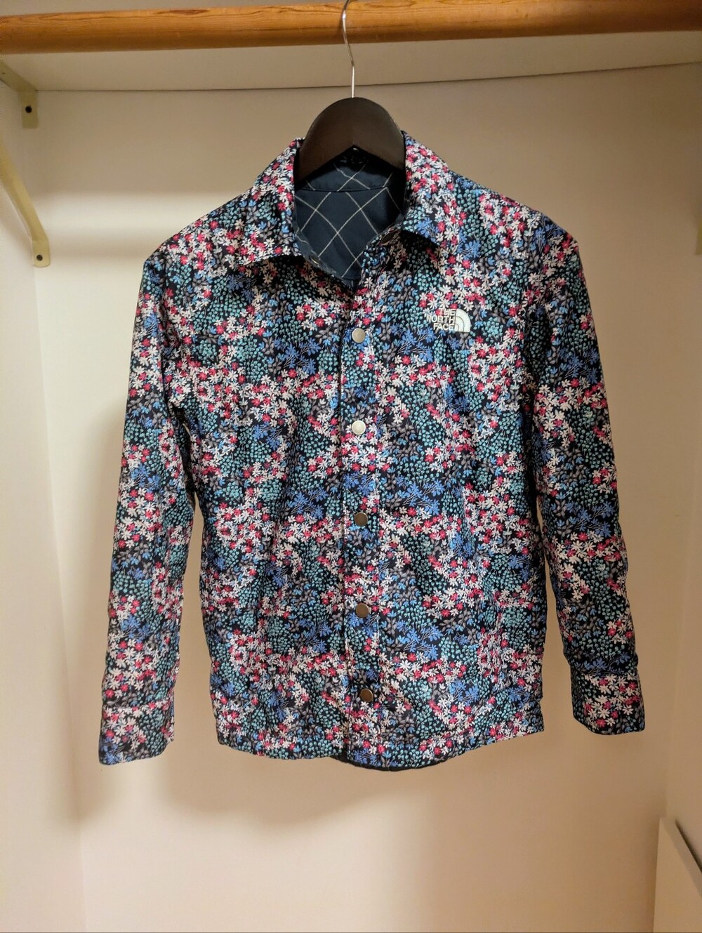 The North Face kid’s reversible Floral quilted coach jacket snap front